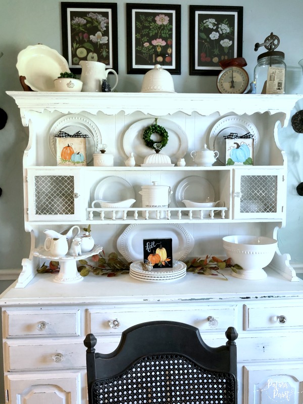 china hutch with fall decor