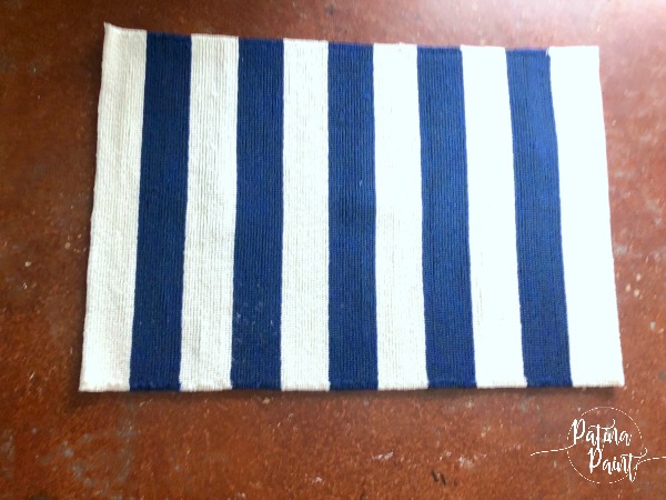 blue and white striped rug