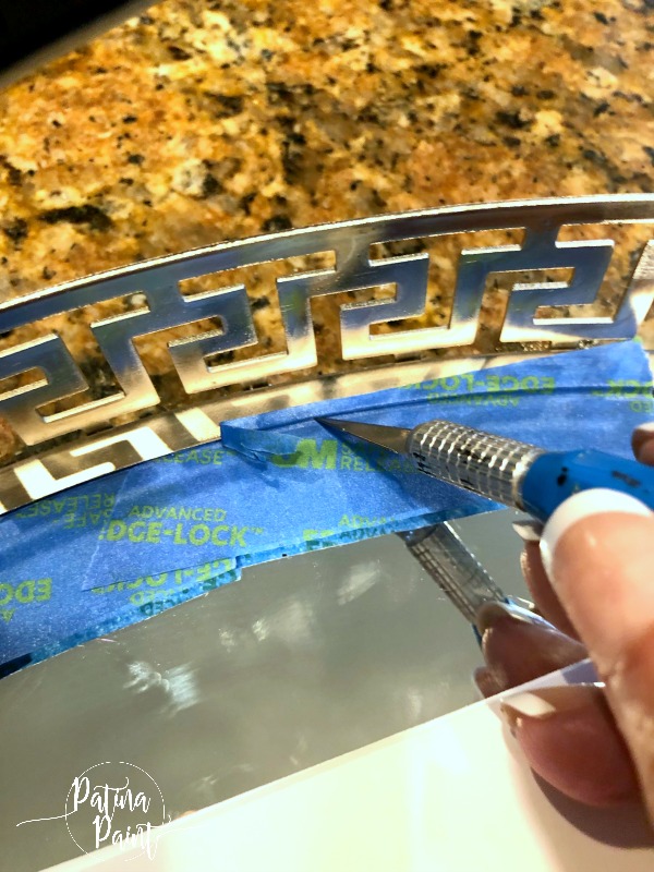 cutting tape with Xacto knife