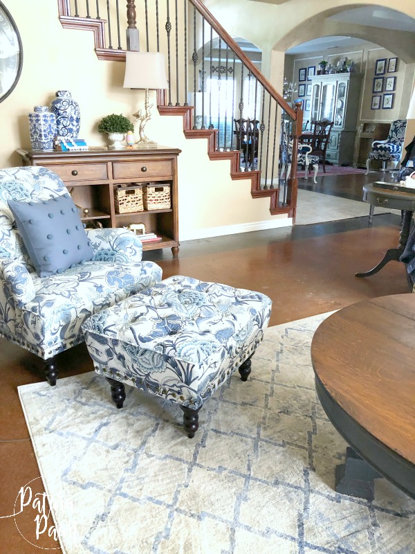 coffee table, chair, ottoman, stairs