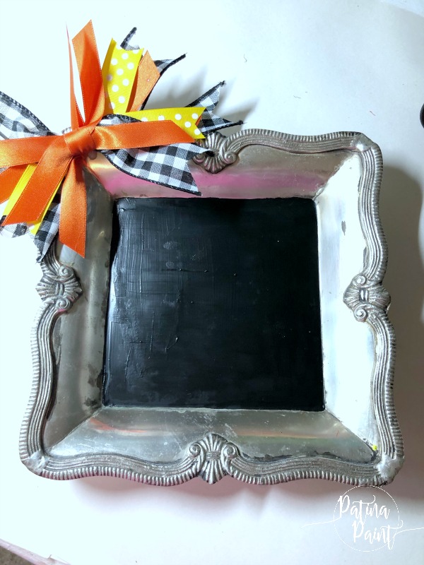 Silver tray with a bow