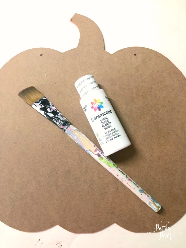wooden pumpkin, paintbrush, paint