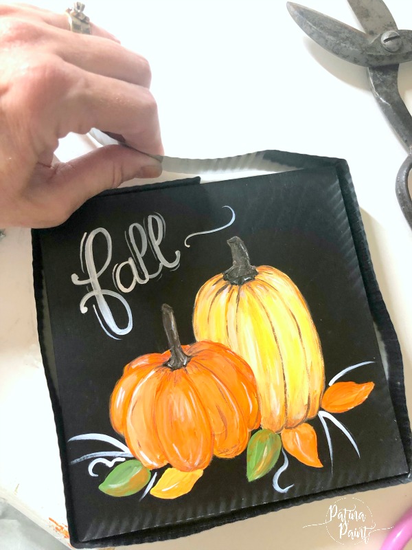 Adding metal to wood art